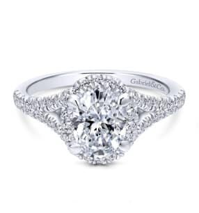 14k white gold round halo engagement ring.