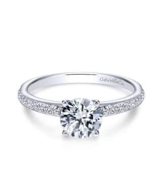 14k white gold round diamond engagement ring.