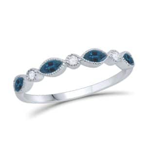 A blue topaz and diamond band ring.