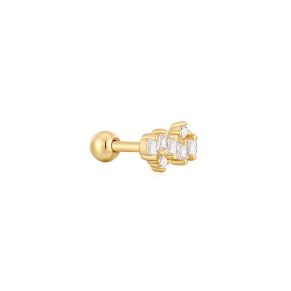 A gold plated ear piercing with cubic zirconia stones.