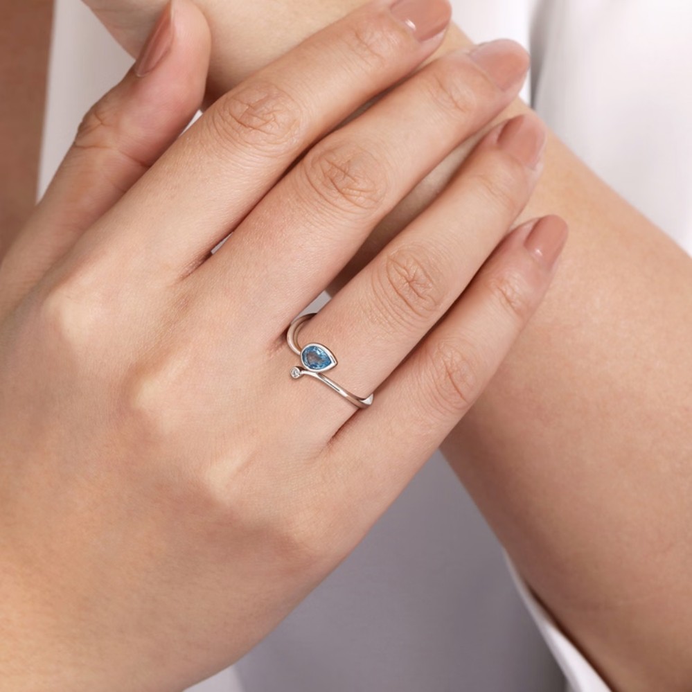 STERLING SILVER BLUE TOPAZ & DIAMOND TEARDROP BYPASS RING LR52253SV5BT